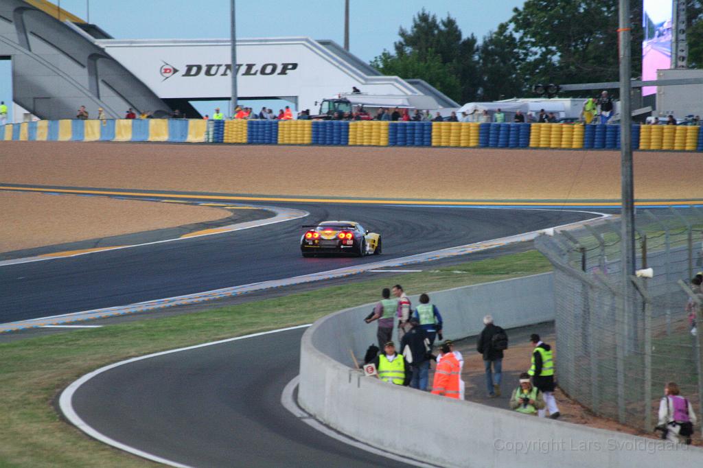 IMG_0074.JPG - Corvette heading up the turn to the Dunlop bridge